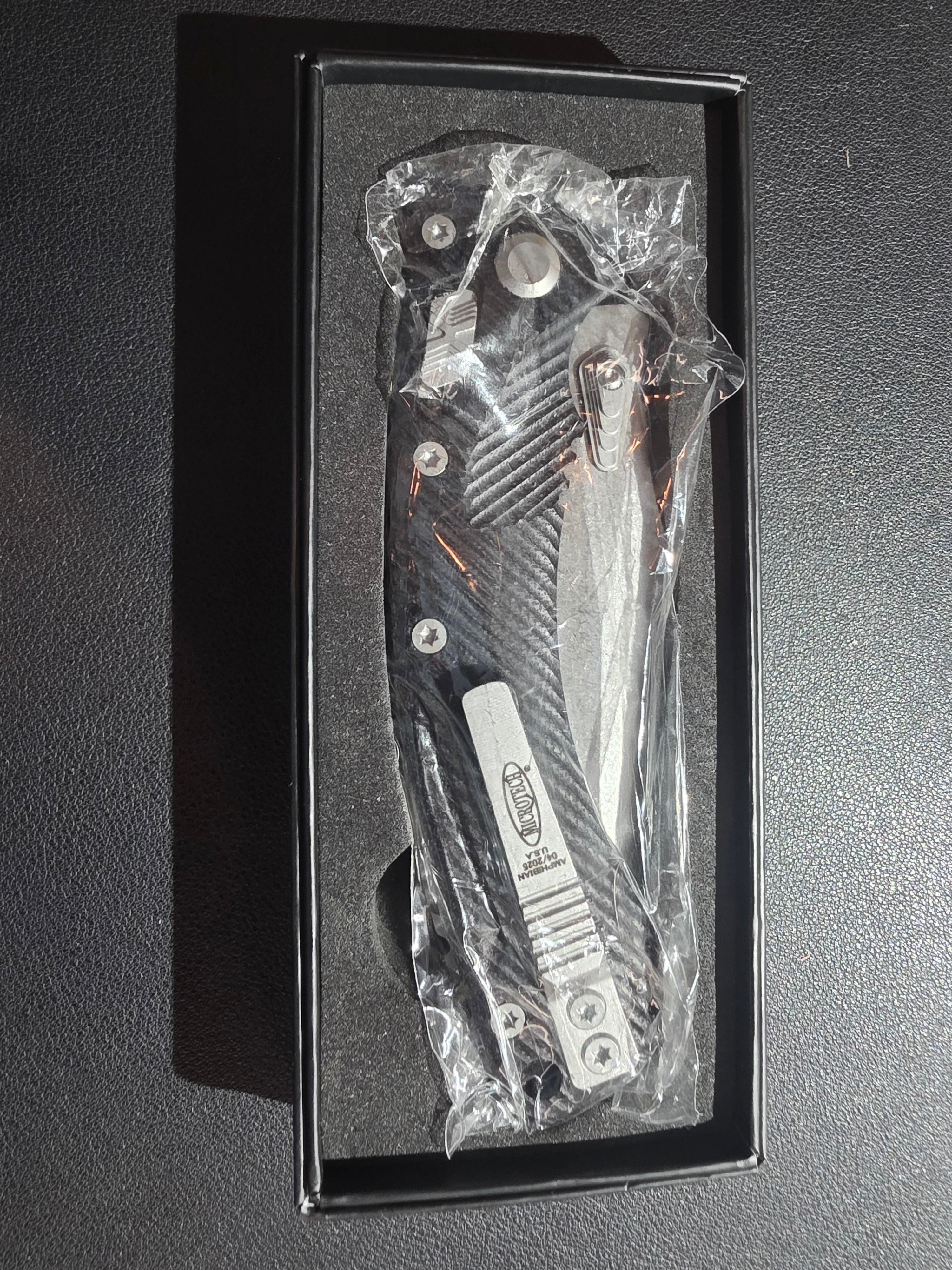 Microtech Amphibian Ram-Lok S/E Manual Knife Fluted Black G-10 (3.9" Stonewash)